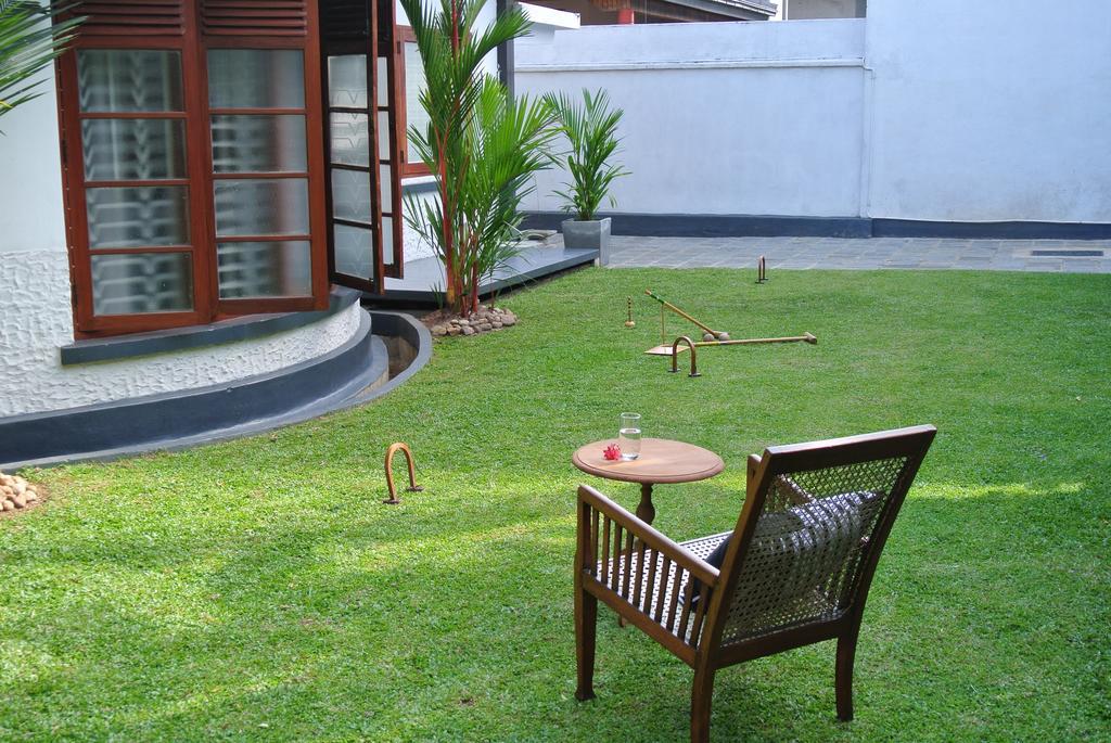 "27" Spathodea- Oasis In The City Colombo Rum bild